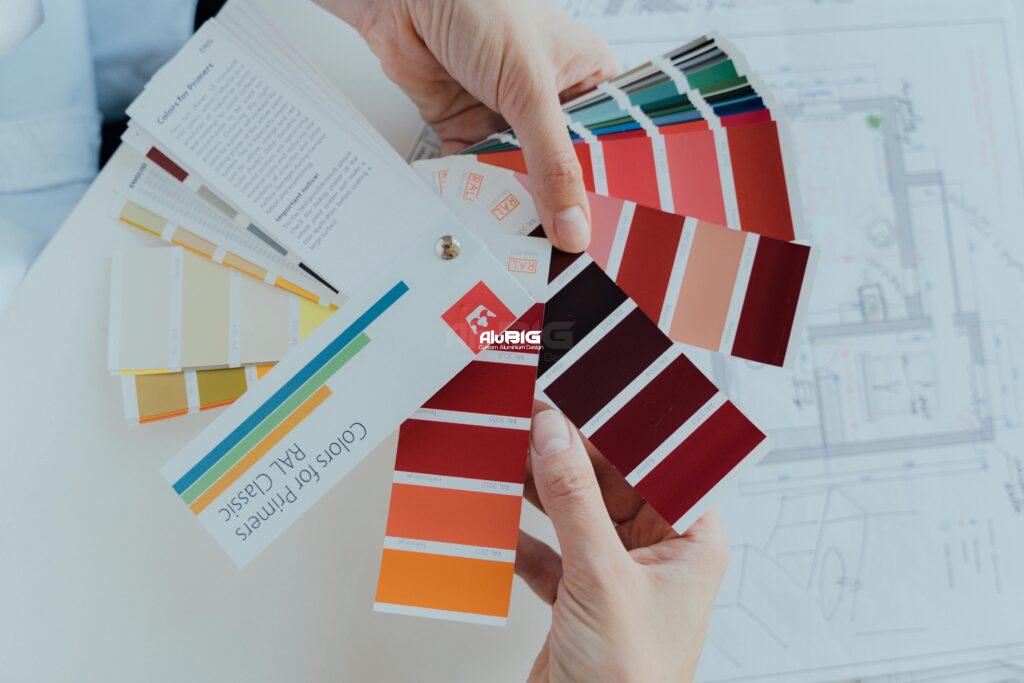 Person choosing color palettes for interior design projects, emphasizing creative choices.